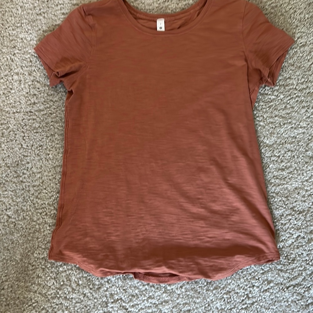 Size 2 orange lululemon shirt